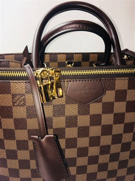 louis vuitton double handle double front buckle bag